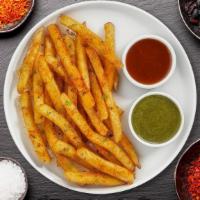 Masala Smash Fries · Golden crispy fries topped with our house made tikka masala sauce.