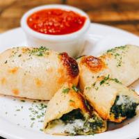 Spinach & Artichoke Rolls · Brushed with garlic butter, filled with spinach, artichoke, feta, cheese blend and served wi...