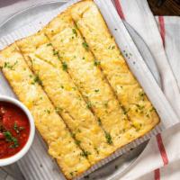 Breadsticks · Brushed with garlic butter, cheese blend and served with marinara.