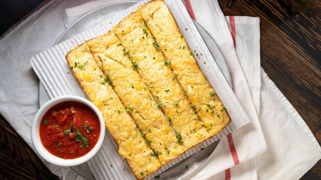 Breadsticks · Brushed with garlic butter, cheese blend and served with marinara.