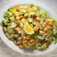 Caesar · Romaine lettuce, shredded Parmesan cheese,  house-made croutons and Caesar dressing.