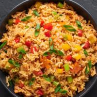 Chinese Vegetable Fried Rice · Chinese fried rice with mixed vegetables, eggs, and onions.