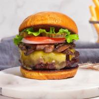 Funghi Feast Burger  · 1/3 lb. beef patty with lettuce, tomatoes, pickles, onions, melted cheese, bacon, and house ...