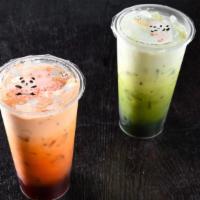 Green Thai Iced Tea · Our House-brewed Green Thai Tea, topped with creamy half & half (24 oz)
