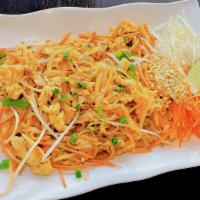 Pad Thai - ผัดไทย · Stir-fried rice noodles with egg, onion, garlic, choice of protein, bean sprouts and our hou...
