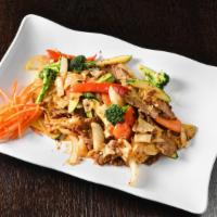 Pad Kee Mow -  ผัดขี้เมา · Stir-fried wide rice noodles with egg, onion, garlic, broccoli, zucchini, mushroom, bamboo s...