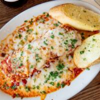 Lasagna · Six cheese Lasagna with Bono’s marinara sauce topped with mozzarella. cheese and baked