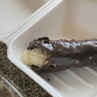 Chocolate Cannoli · Homemade cannoli cream in a chocolate pastry shell