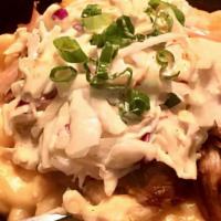 Family - Loaded Mac N' Cheese · double portion of mac and our three cheese sauce topped with slow roasted pork, house slaw a...