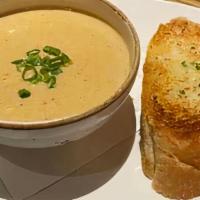 Creamy Crab Soup · Maryland style - lump crabmeat, gruyere cheese, old bay seasoning, scallions - served with g...