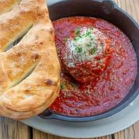 Giant Meatball · our giant 9 oz meatball in a pepperoni sauce, topped with parmesan & parsley - served with o...