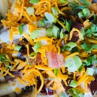 Fire Fries Fully Dressed · house ghost pepper seasoning, peppercorn ranch, sharp cheddar cheese, bacon bits, scallions