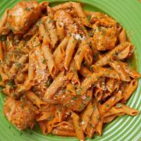 Vodka & Penne With Chicken · Chicken breast, reduced fat vodka sauce and parmesan cheese over whole wheat pasta.