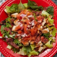 Mardi Gras Salad · Cajun seasoned chicken breast with turkey bacon, tomatoes, red onions and low carb salsetta ...