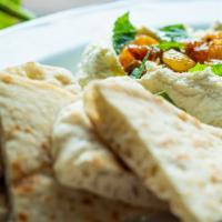 Whipped Feta · Pasteurized Feta Cheese whipped with a little bit of cream cheese and topped with Mint, Pick...