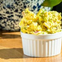 French Curry Potato Salad (3 Oz.) · Russet Potatoes, Red Onions, Celery with a Creamy Vadouvan Curry Dressing
