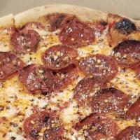 Hot Pepperoni (Nitrate-Free) · Tomato sauce, zoe's perpperoni, shredded mozzarella, and mike's hot honey.