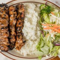 Chicken Skewer · Served with rice and vegetables.