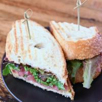 Porch Song · Prosciutto, Brie cheese, fig, greens on sourdough.