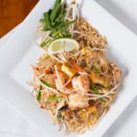 Pad Thai · Classic Rice Stick Noodles with prawns, tofu, egg, bean sprouts, peanuts, chives, radish.