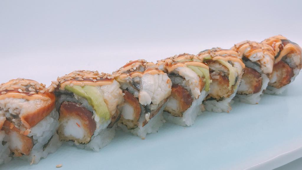 Black Dragon Roll · Shrimp tempura, spicy tuna inside, topped with eel, avocado.