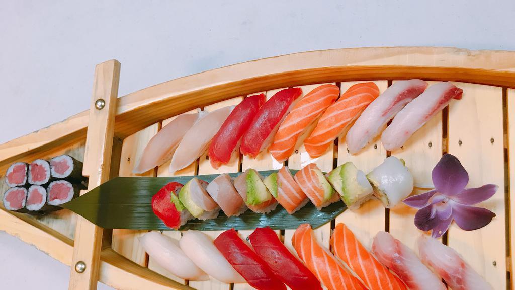 Sushi (For Two) · 16 pieces sushi, tuna roll & rainbow roll.