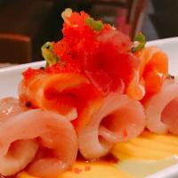 Sakura App · One piece tuna, two piece salmon, three piece yellowtail with mango, and jalapeno sauce.