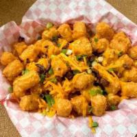 Fried Potaotes / Khaoi Chien · Choose between fries or Tater tots. Can add cheese or cheese and bacon.