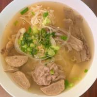 Combination Pho / Pho Dac Biet · Includes beef, tendon, tripe, flank, brisket, and meatball.