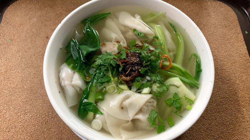 Wonton Soup / Sup Hoanh Thanh · Pork wonton dumplings and bokchoy in a clear, savory broth.
