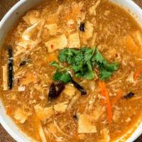 Hot & Sour Soup · Súp Chua Cay
Bamboo, tofu, mushroom, carrots, and egg drop in a sour and spicy favorite.