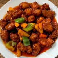 Sweet And Sour · Deep fried breaded chicken or tofu with a sweet and sour sauce, stir fried with pineapple, o...