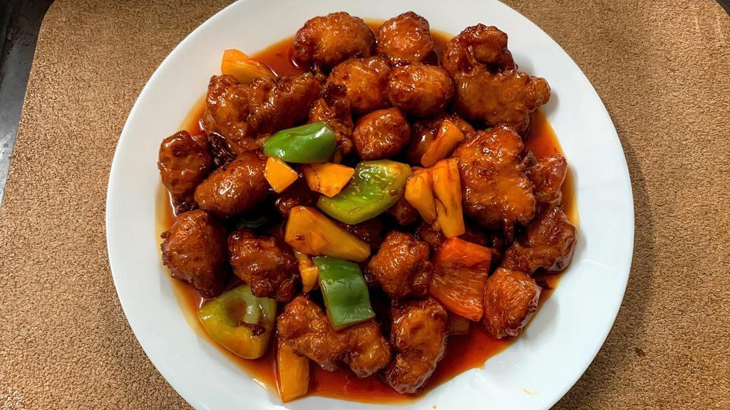 Sweet And Sour · Deep fried breaded chicken or tofu with a sweet and sour sauce, stir fried with pineapple, onions and bell peppers.