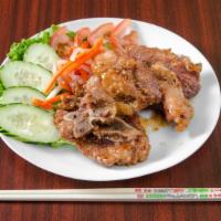 Honey Garlic Pork Chop · Pork chops marinated in honey garlic, flash fried then stir fried with a honey garlic glaze.