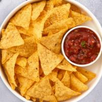 Chips & Salsa Love Story · Plain chips with pico de gallo salsa on the side