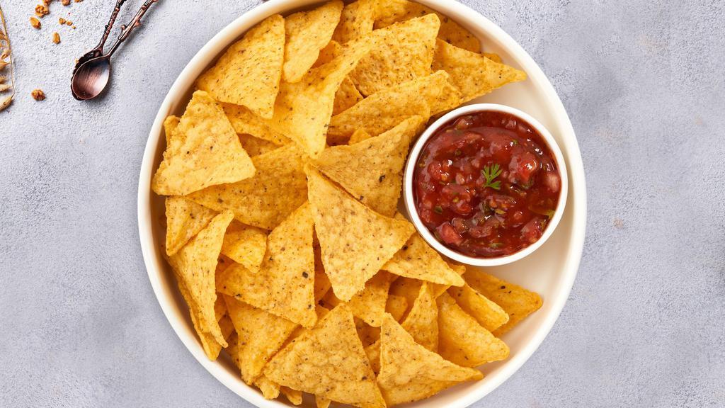 Chips & Salsa Love Story · Plain chips with pico de gallo salsa on the side
