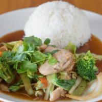 Ginger Chicken · Stir-fried chicken breast with mixed vegetables and ginger served with a side of steamed rice.