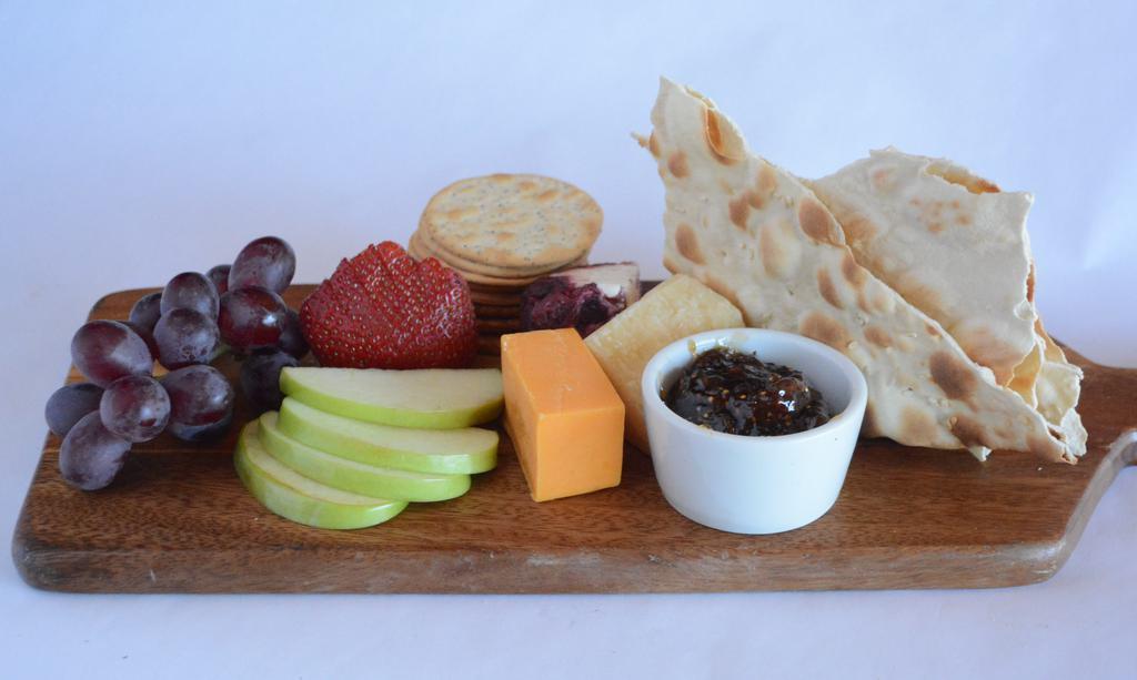 Artisan Cheese Board · Chef's selection of seasonal cheeses and accoutrements.