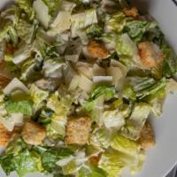 Side Caesar Salad · Romaine, Parmesan crisp, cracked black pepper, croutons and Caesar dressing.