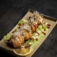 Takoyaki  (4Pcs) · Deep-Fried ball shaped batter filled with Octopus and Vegetables