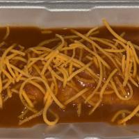 Burrada Burrito Smothered In Enchilada Sauce · Bean burrito Smothered in our famous ENCHILADA sauce. Fan Favorite