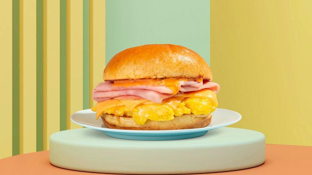 Ham, Egg And Cheese Sandwich · Eggs with savory ham and melted cheese.