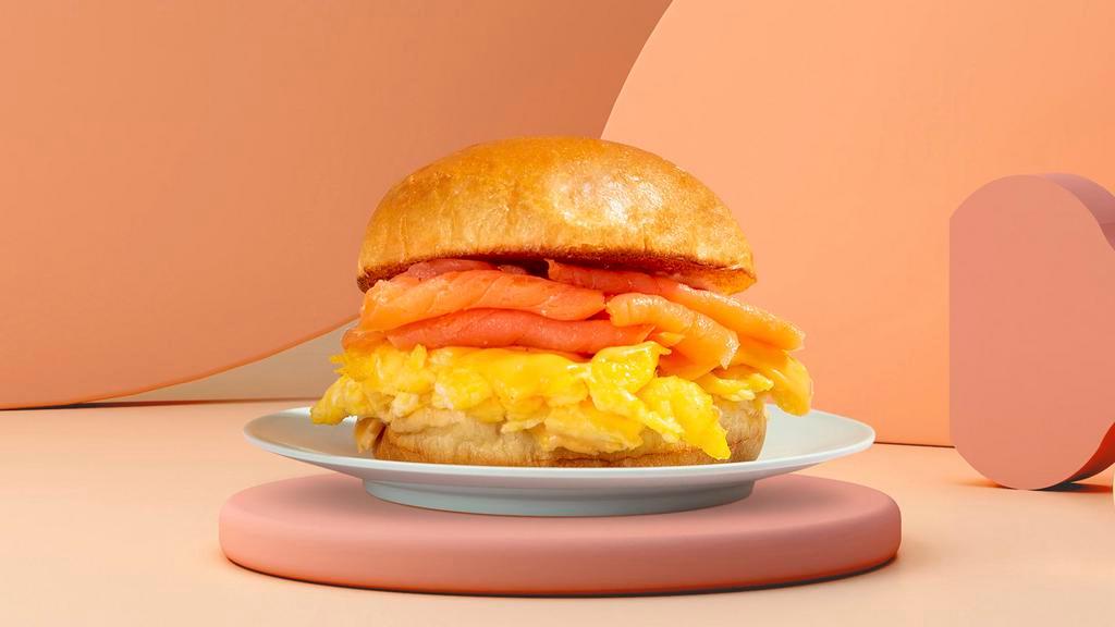 Smoked Salmon, Egg & Cheese Sandwich · Eggs with smoked salmon and melted cheese.