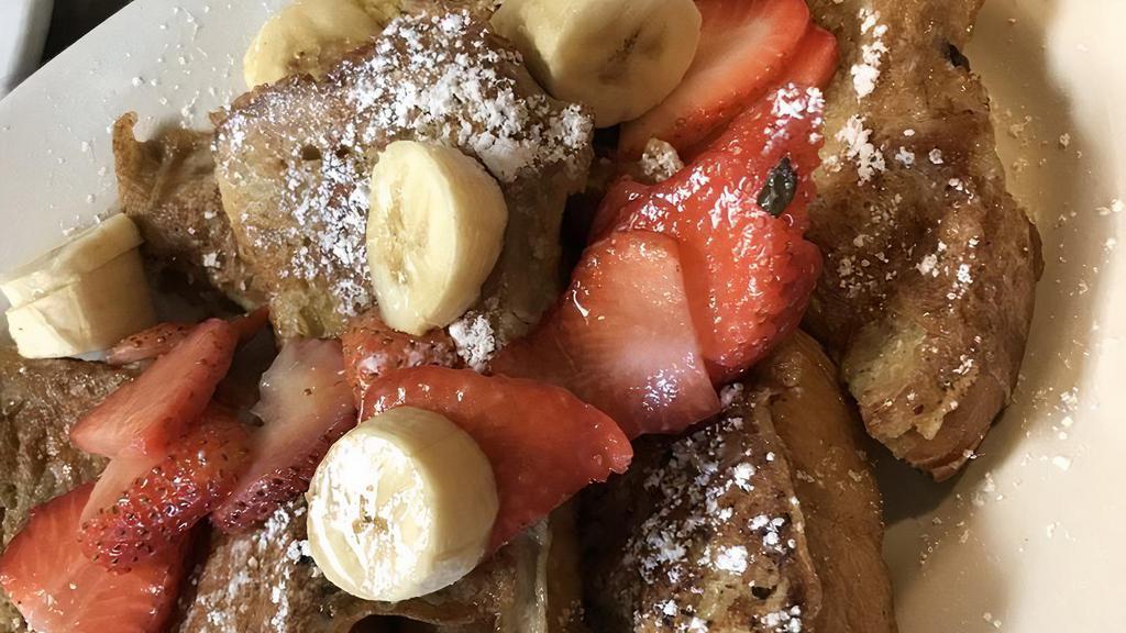 Creme Brulee French Toast · Wow wow wow. this is to die for! three pieces of battered French bread baked and grilled to perfection and topped with powdered sugar. Add strawberries and whip.