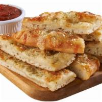 Cheesebread (Small) · Our mouth watering cheesebread is topped with garlic butter, special seasoning, and a layer ...