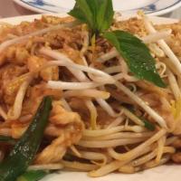 Phad Thai · Rice noodles, eggs, tofu, bean sprouts, green onions, and sprinkled on top with crushed pean...