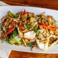 Pad Kee Mao · Wok tossed wide noodles, mixed vegetables and egg, with garlic-chili paste.