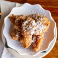 Fried Banana · Dusted with powdered sugar.