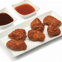Boneless Wings - 6 · Crispy and flavorful classic chicken wings with choice of 1 flavor-packed sauce.