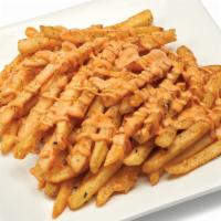 Spicy Asian Fries · Spicy fries with our Japanese Seven-spice blend and topped with spicy mayo.